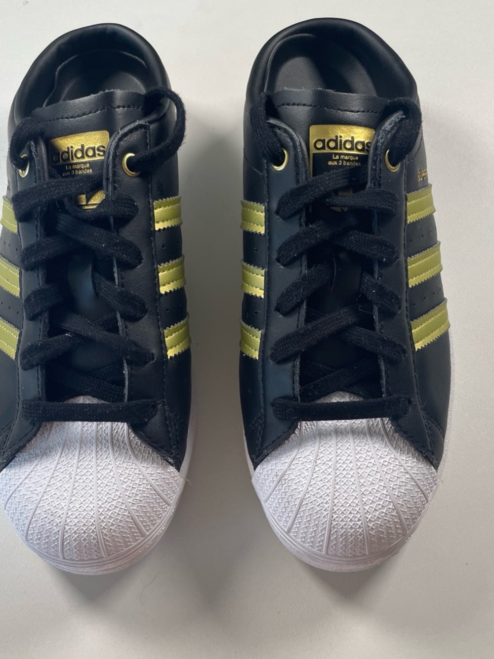 adidas Black Sneakers with Gold Stripes and White Shell Toe